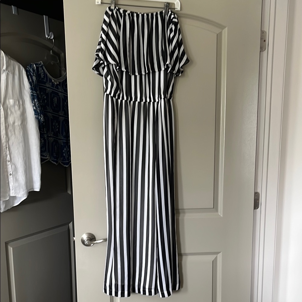 Black and White Striped Off-Shoulder jumpsuit.